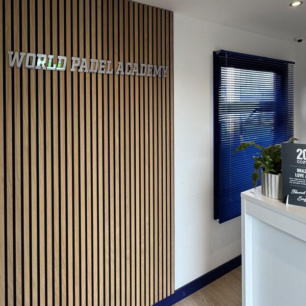 Venetian blinds fitted across commercial office windows