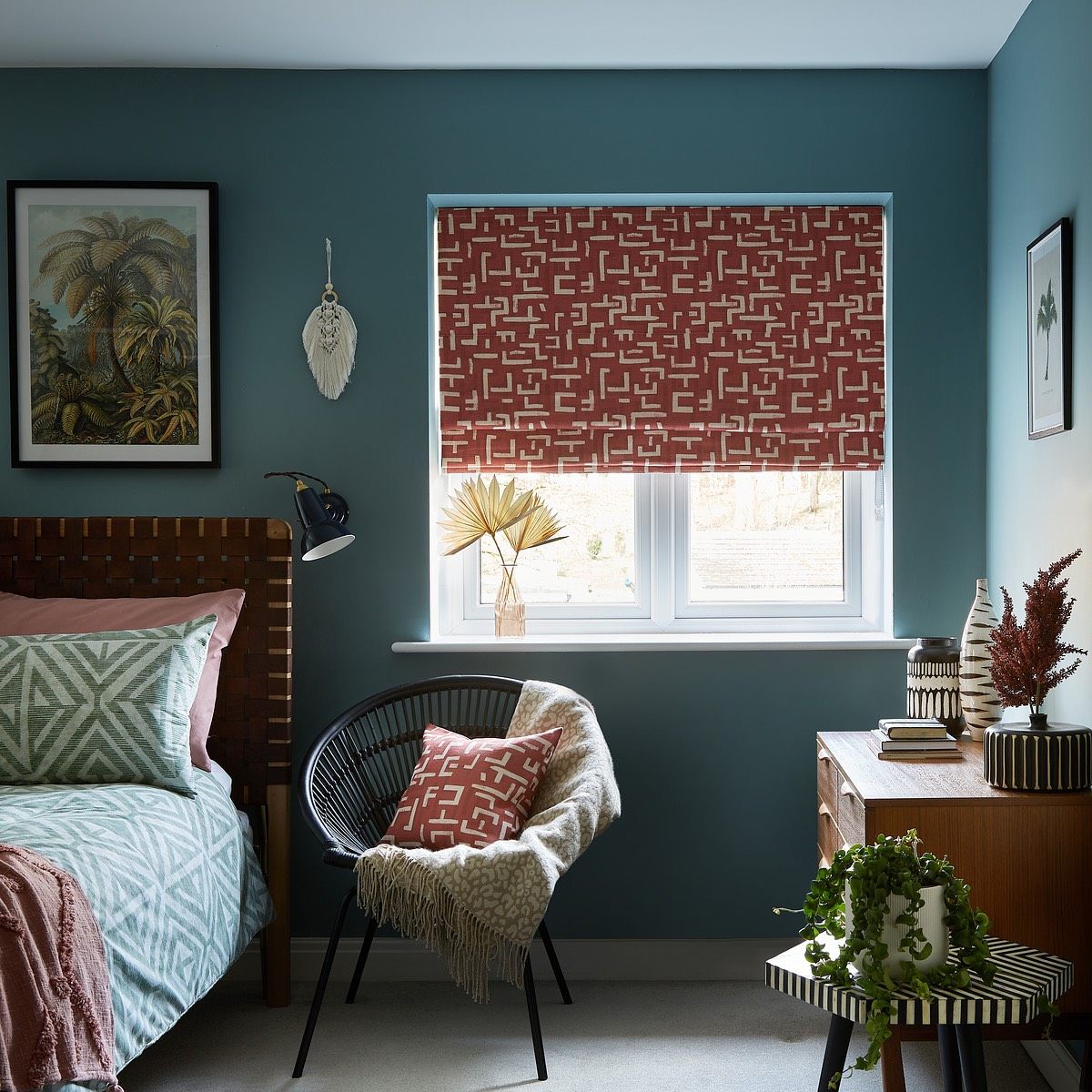 Patterned made-to-measure roman blind fitted in a bedroom