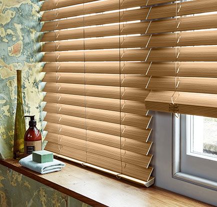 Wooden venetian blinds fitted to a home window